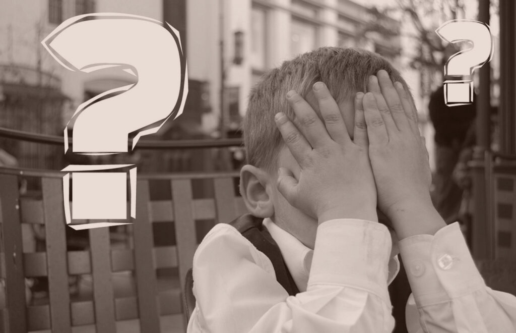 kid with hands in face mistake